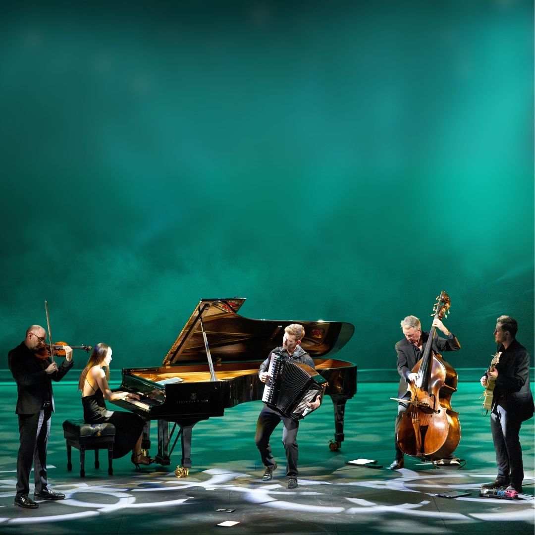 Aotango Performing on green backdrop