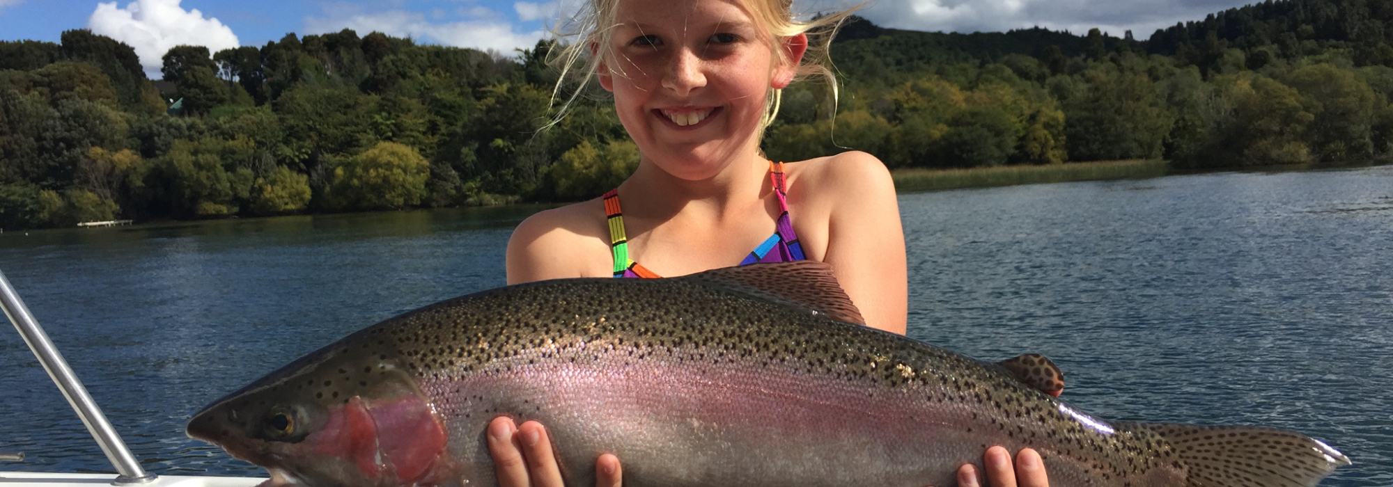 Head to Rotorua if you’re angling for an amazing family fishing adventure